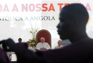 Pope Benedict XVI watches a dance performance by Angolan youths during a rally at Coqueiros Stadium in Luanda. (CNS photo: Alessia Giuliani, CPP)