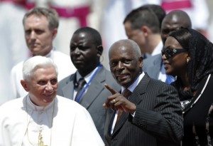 Angola's President Jos� Eduardo dos Santos speaks to Pope Benedict XVI after the pope arrived in Luanda for the second leg of his trip to Africa on March 20. (CNS photo: Alessandro Bianchi, Reuters) 
