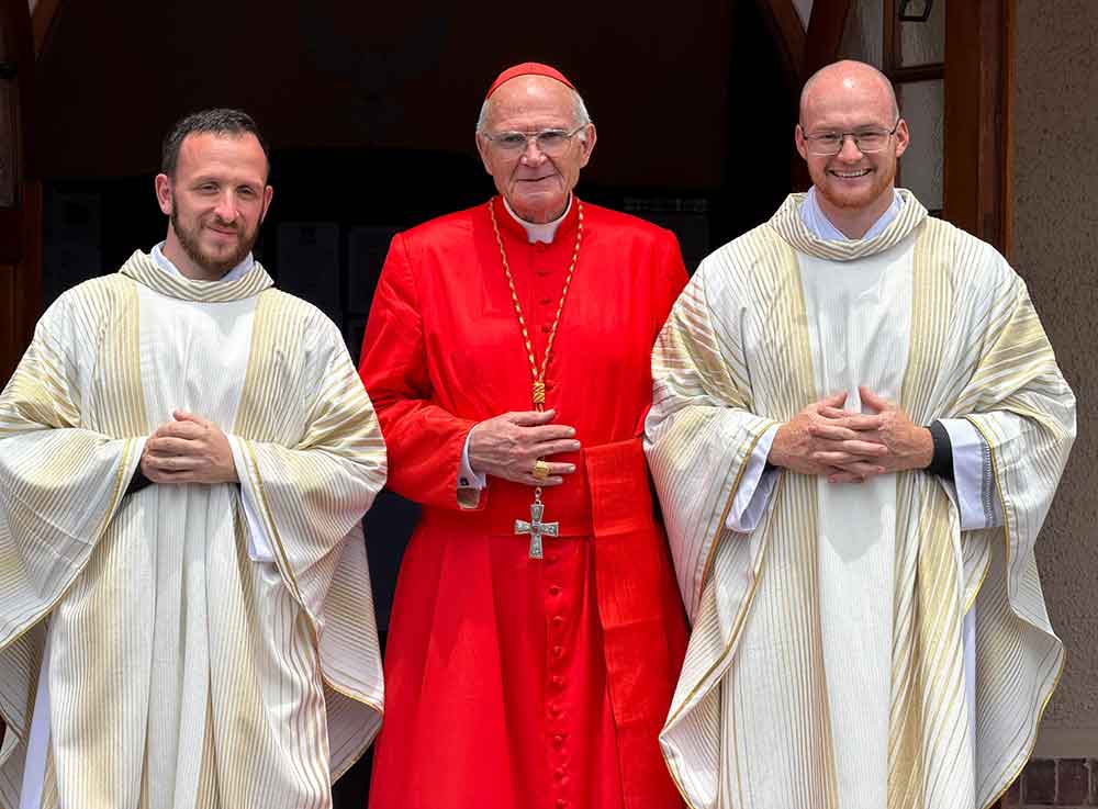 Cardinal Brislin with newly-ordained Fr Moore and Fr Rice