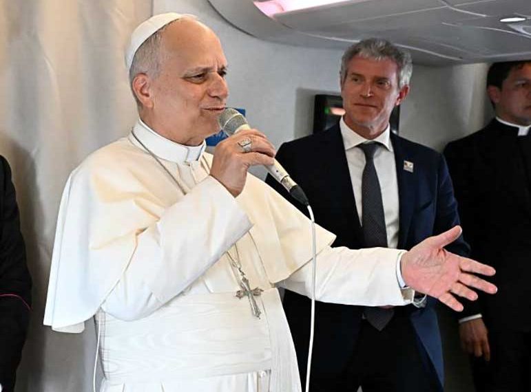 Pope on plane to Angola