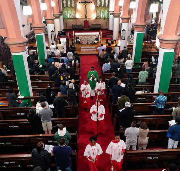 The concluding procession at St Augustine's Cathedral, Diocese of Port Elizabeth, as the congregation remains standing in prayer and song. Photo by Gregory b. Stephenson