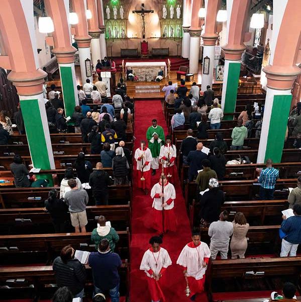 The concluding procession at St Augustine's Cathedral, Diocese of Port Elizabeth, as the congregation remains standing in prayer and song. Photo by Gregory b. Stephenson