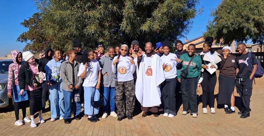 Parish Priest Fr Sandile Madotyeni with some of the young people who attended Franciscan Youth Event at St Benedicts parish Zone 3 Sebokeng